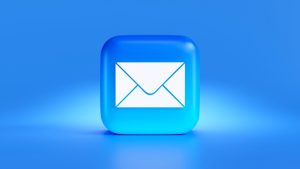 Email envelope icon on blue field